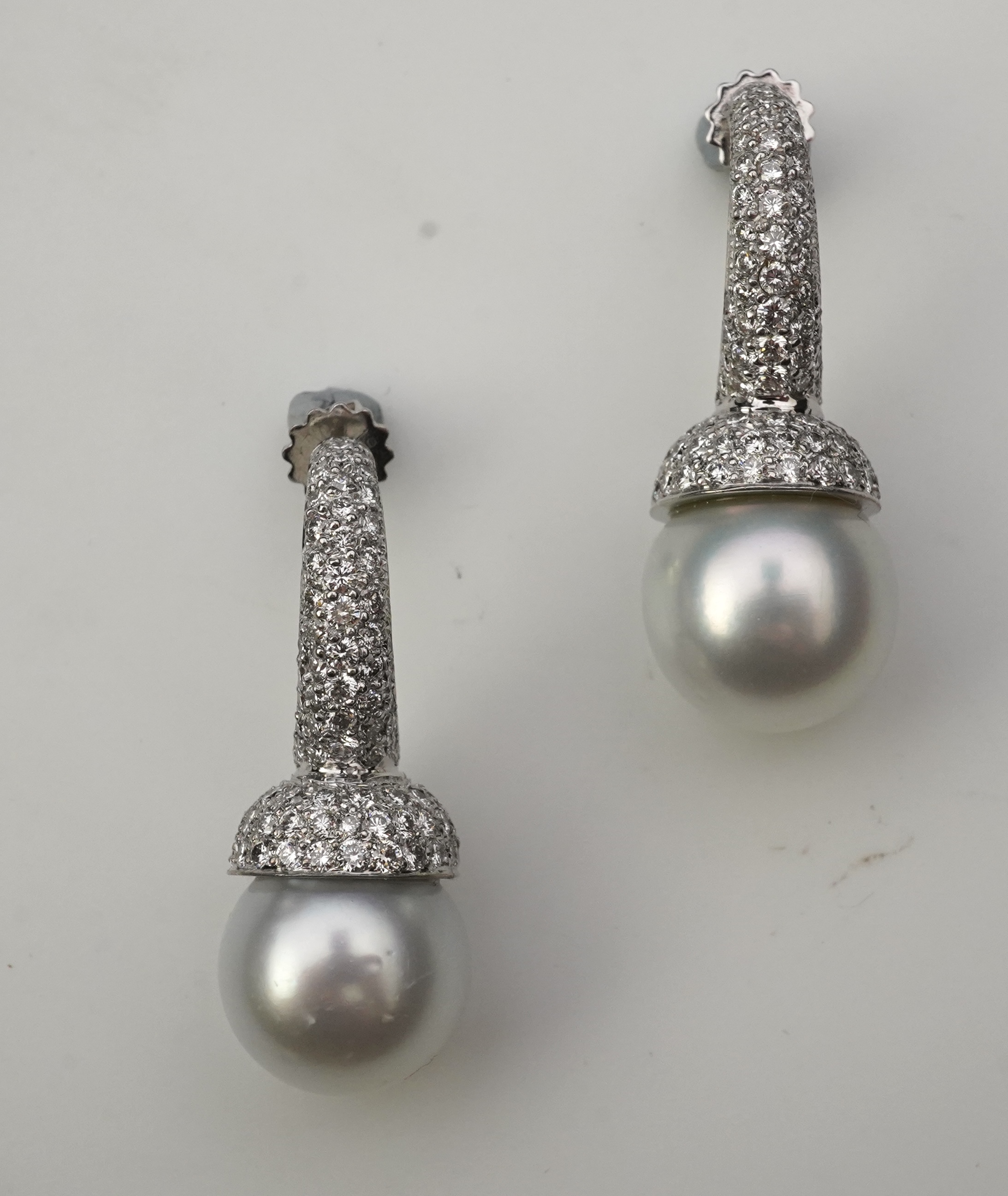 A pair of South Sea cultured pearl and diamond earrings